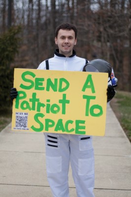 Graduate student, Kamil Stelmach, campaigning to go to space. Stelmach was seen wandering campus in an astronaut suit, asking people to vote for him to go to space camp. (Jenny Krashin/Broadside)